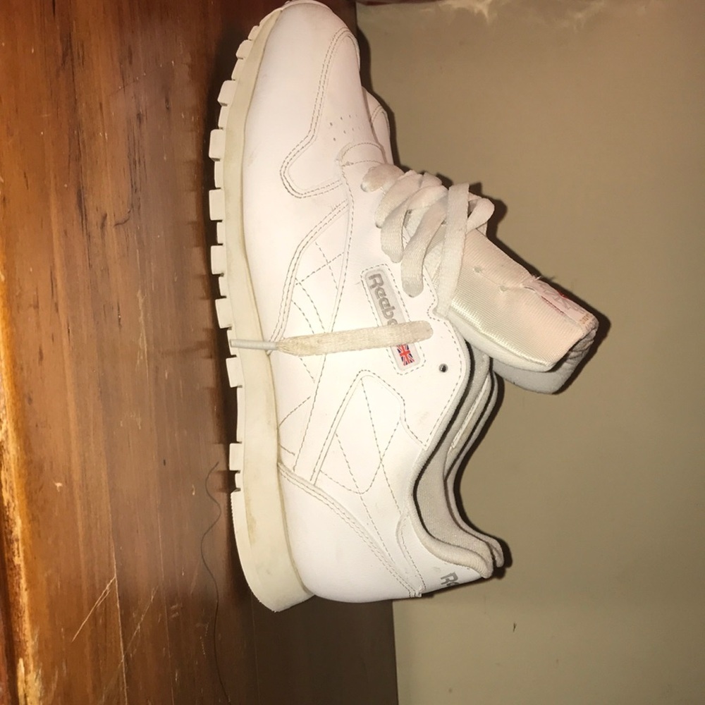 All white reebok classic.